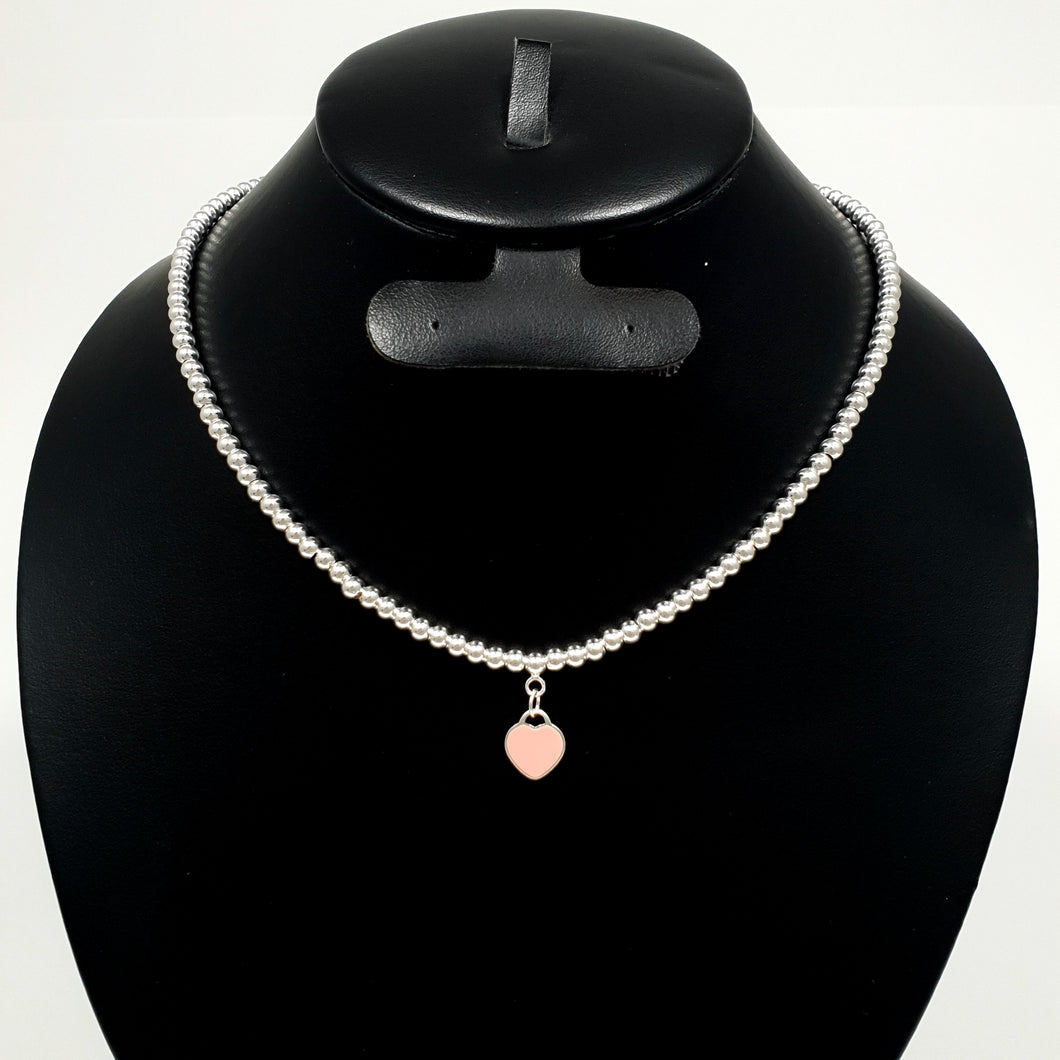 Collar de cuentas T&Co con placa de corazón (Nuevo Modelo)